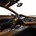 The interior mixes high end materials including rosewood and titanium