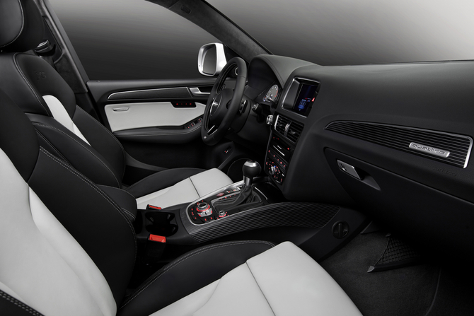 The interior includes aluminum trim and power seats