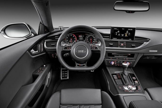 The interior includes a flat-bottom steering wheel