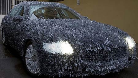 Maserati covered with 1,763 lbs of shattered glass