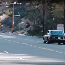 Jay Leno drives the British flaired Jensen Interceptor