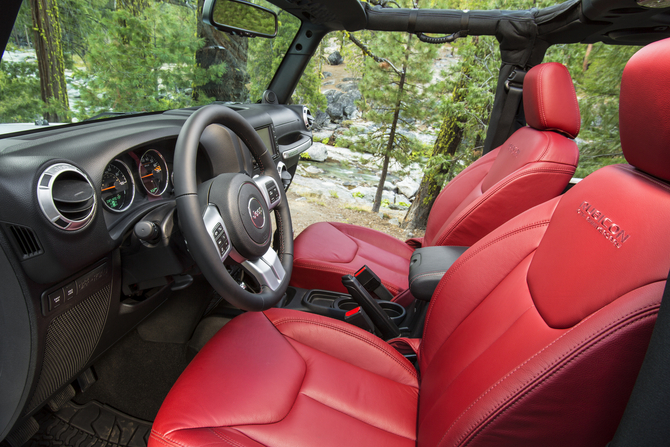 The interior is covered in red leather. 