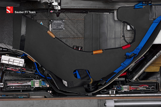 A Formula 1 car's seat appears extremely uncomfortable A Formula 1 car's seat appears extremely uncomfortable