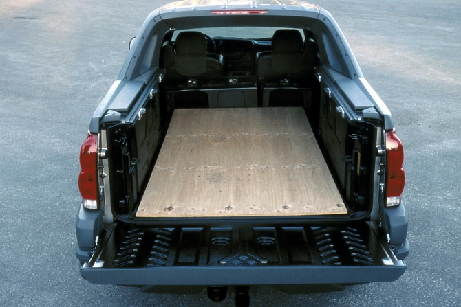 The Avalanche converted from SUV to pickup by removing a partition and laying the seats down