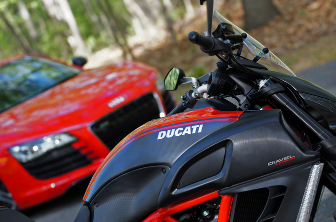 This image shows the Diavel more prominently with the R8 in the background