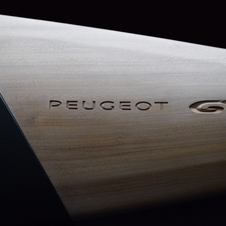 The front is made from carbon fiber with GTI embellished into it