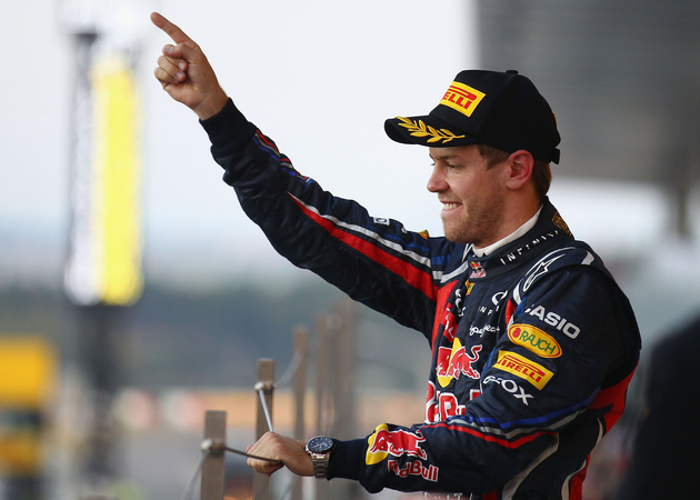 Vettel world champion in Button win