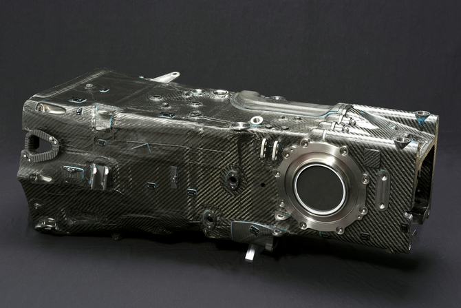 Audi developed a carbon fiber transmission case for its 900kg race car, a major technical innovation 