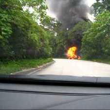 Nissan GTR R35 on fire after crashing with VW Golf.